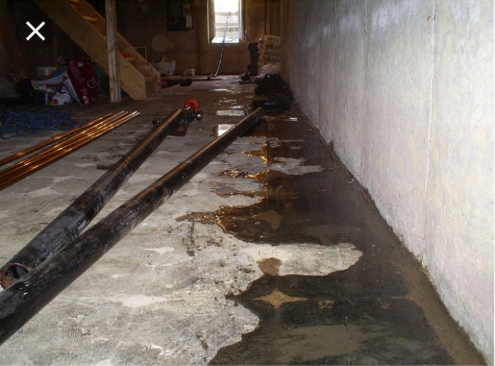 Water seeping along basement wall joint before waterproofing — Overland Park, KS