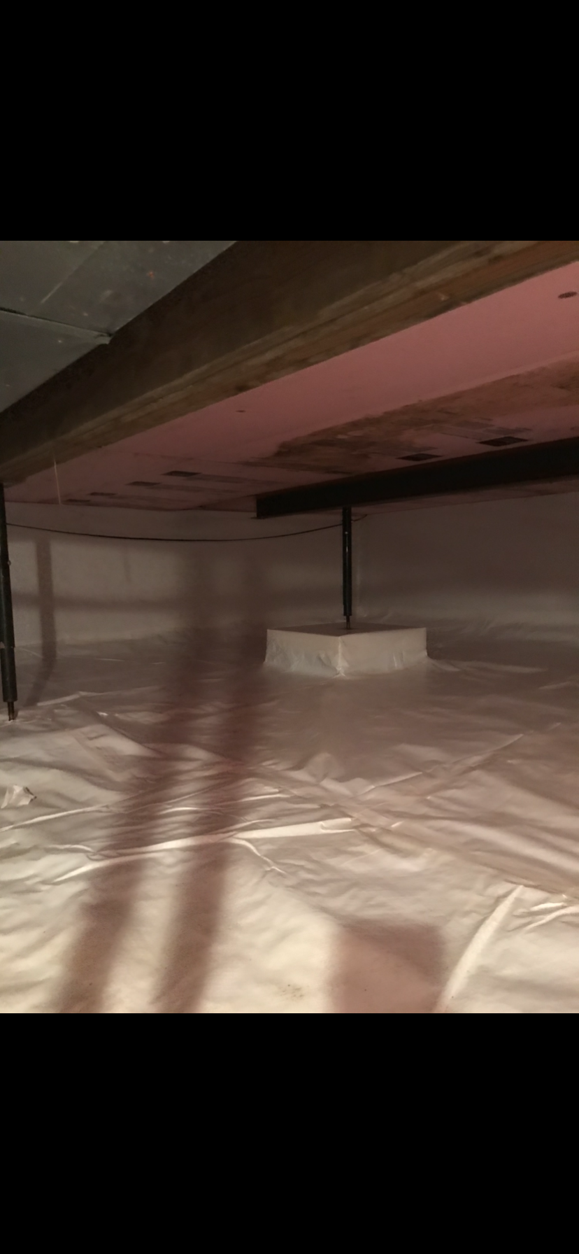 Full view of sealed and encapsulated crawlspace with foam board insulation — Ankeny, IA