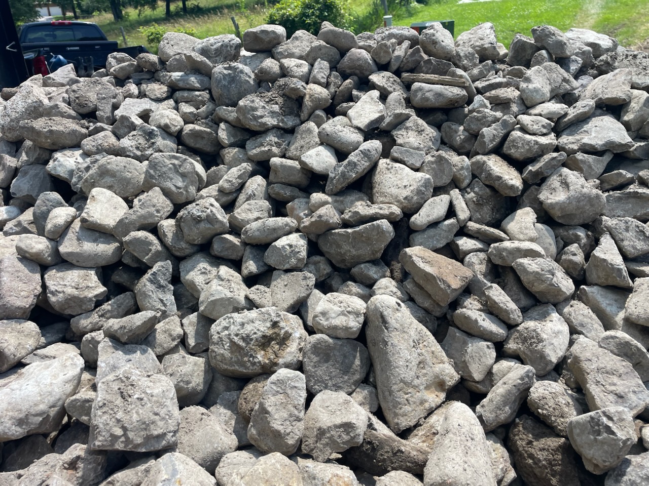 Drainage rock delivered for swale construction — Shawnee, KS