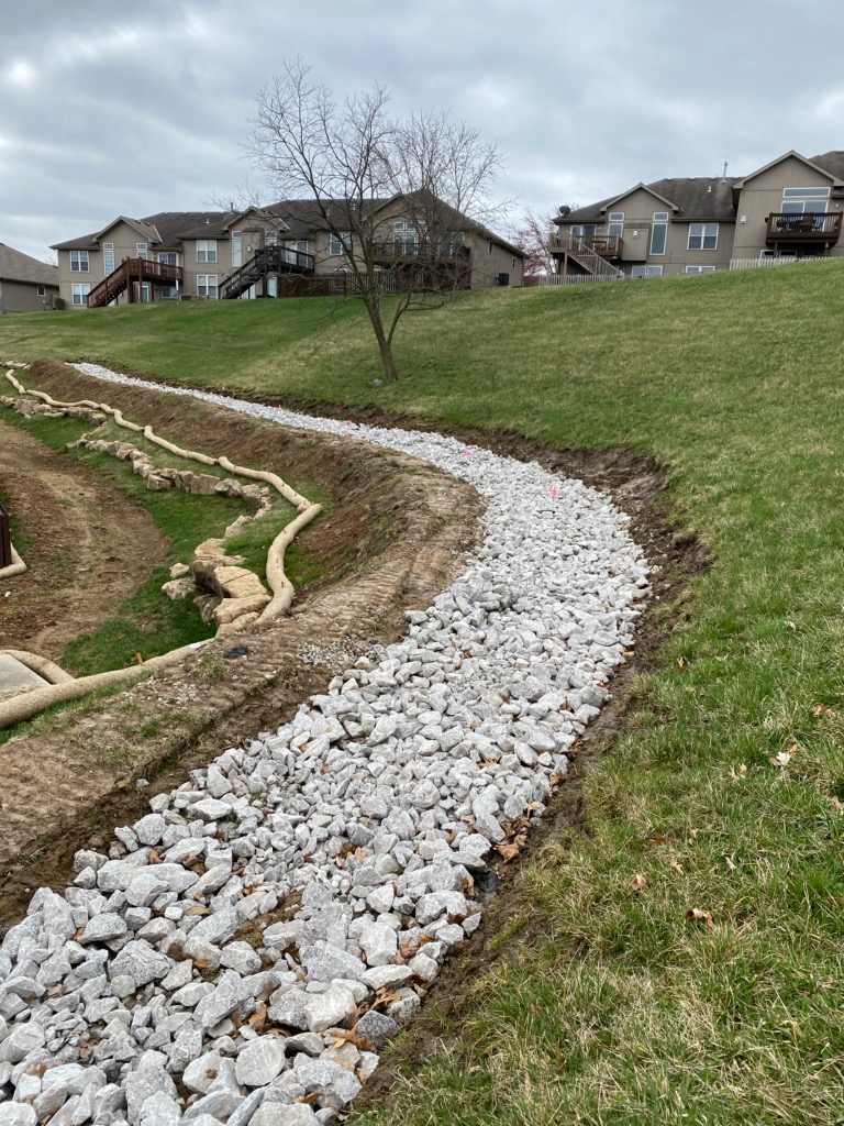 Completed drainage system after grass has regrown — Lee's Summit, MO