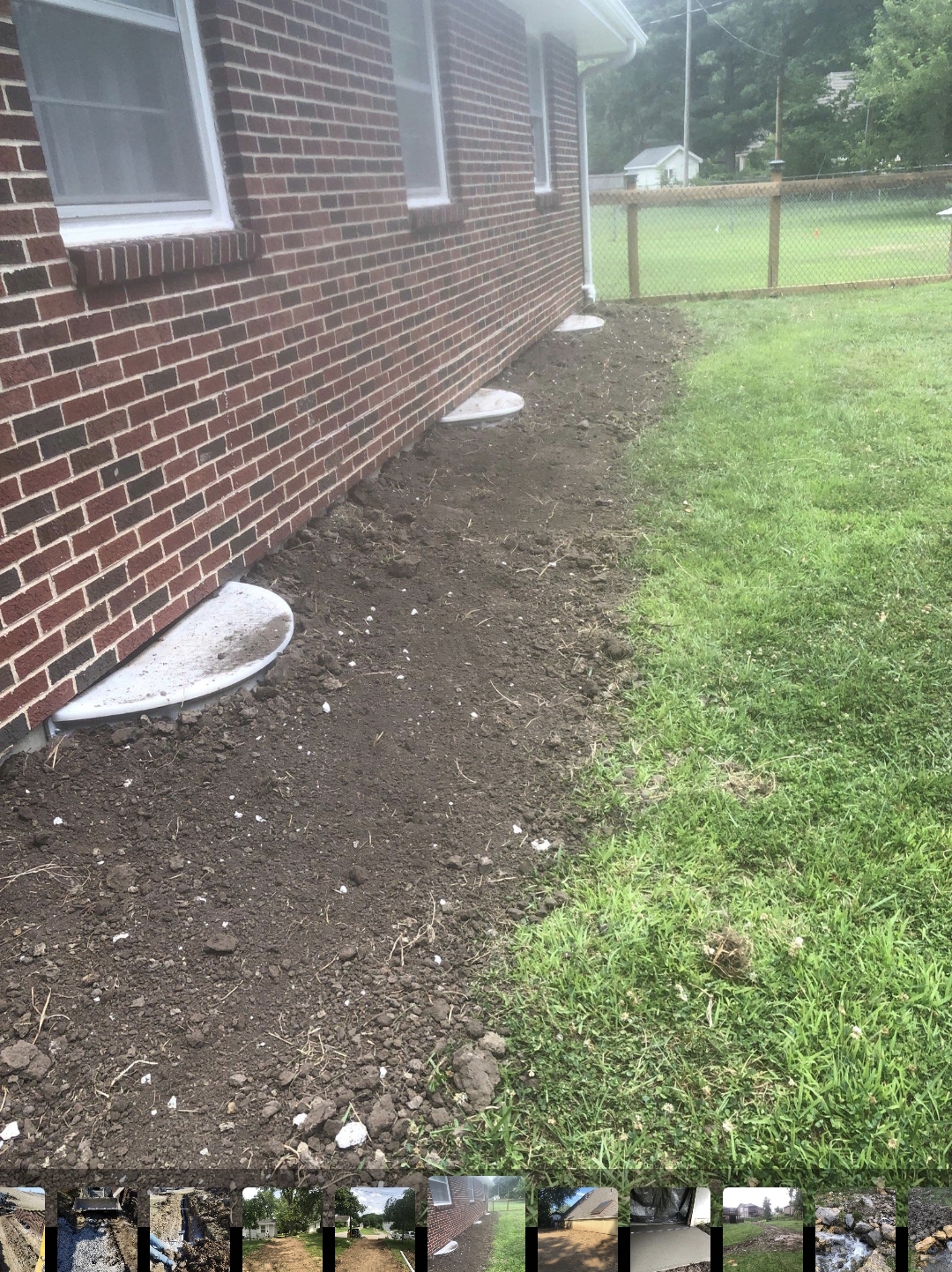 Completed downspout extensions and grading away from foundation — Olathe, KS