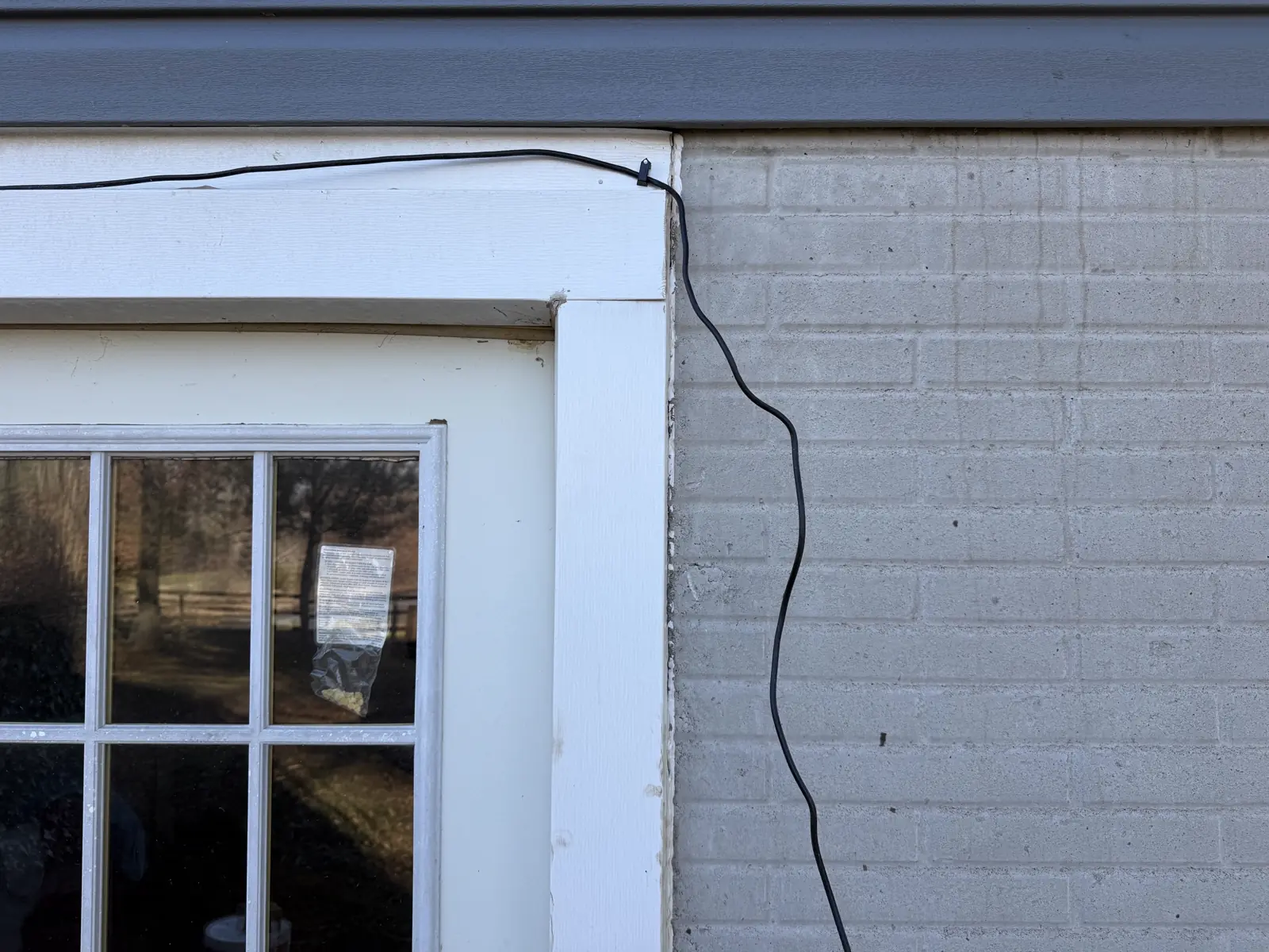 Significant gap between door frame and wall structure — Independence, Missouri