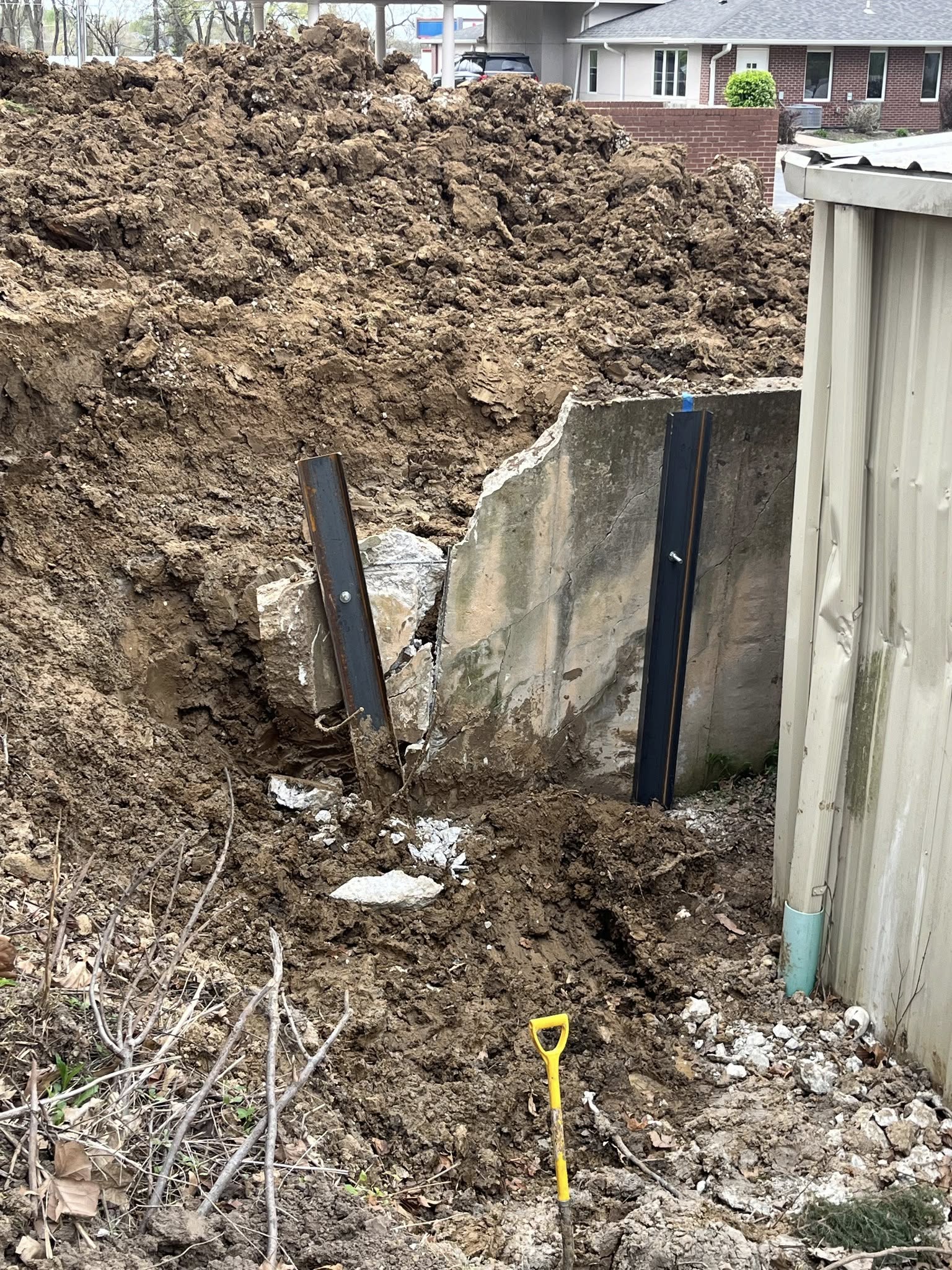 Exterior wall anchor installation with hydraulic equipment — Lenexa, KS