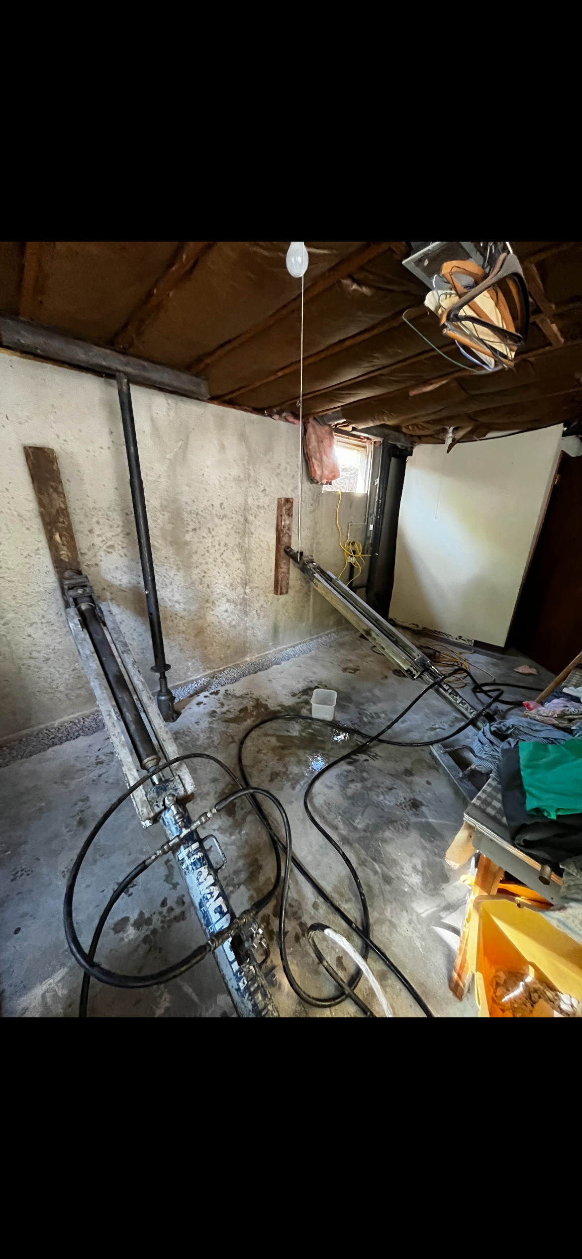 Wall braces installed in basement utility area — West Des Moines, IA