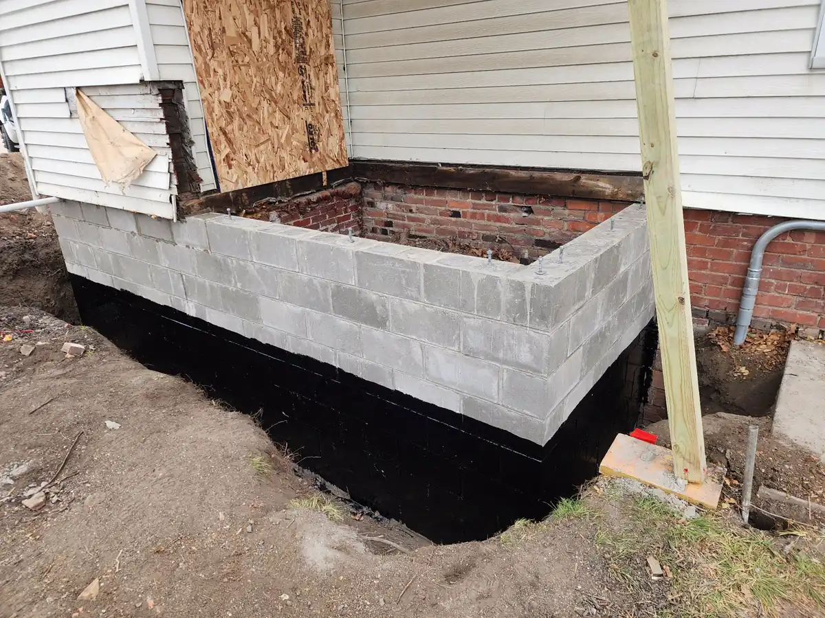 New foundation wall complete and framing reconnected — Ankeny, IA