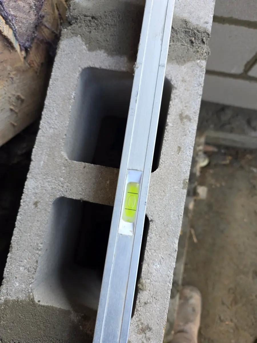 Wooden forms set for new poured concrete foundation wall — Kearney, MO