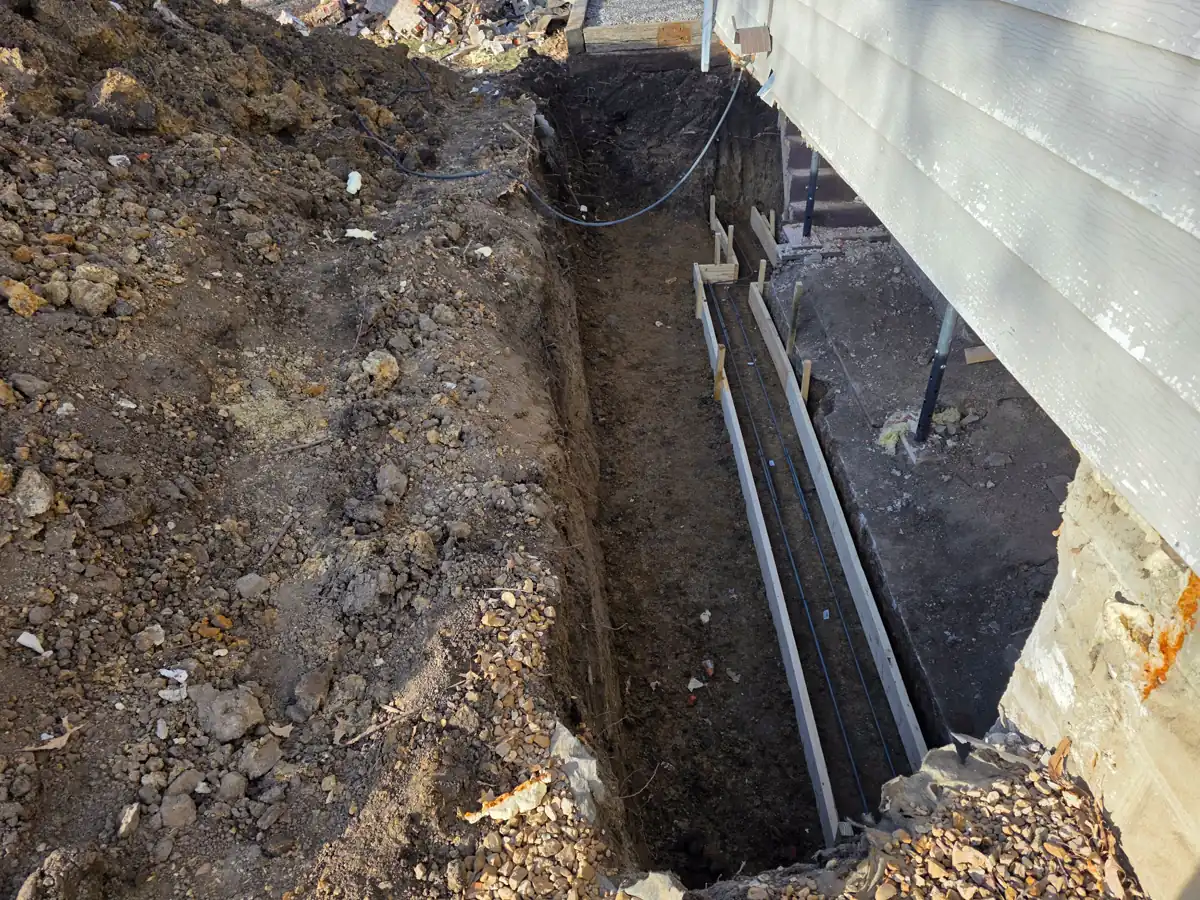 Fresh concrete being poured into wall forms — Kearney, MO