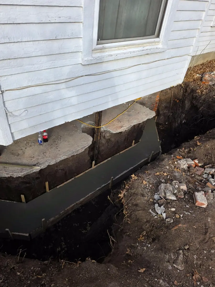Deteriorated foundation wall exposed after excavation — West Des Moines, Iowa