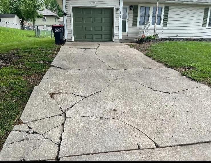Cracked and settling concrete driveway — Leawood, KS