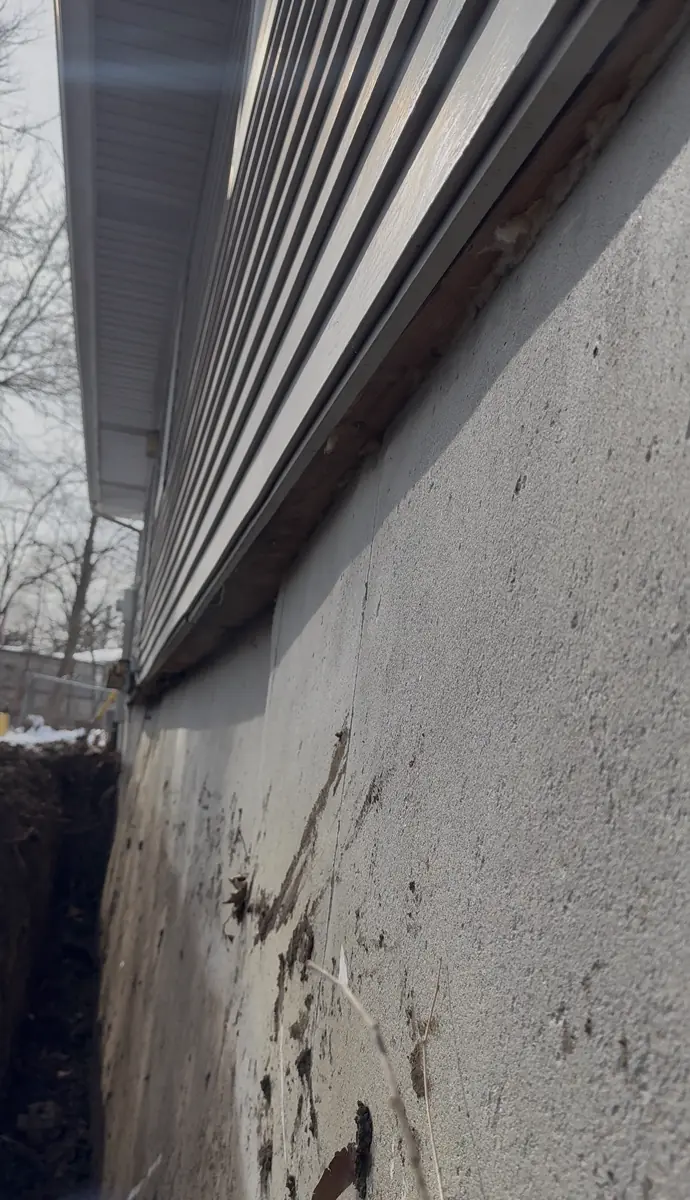 Exposed bowed foundation wall after excavation — Raytown, MO