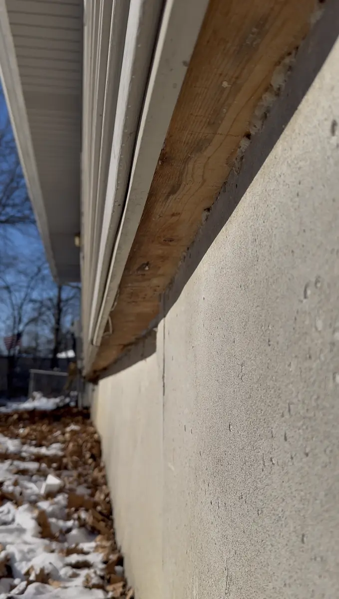 Waterproofing membrane applied to straightened wall exterior — Raytown, Missouri
