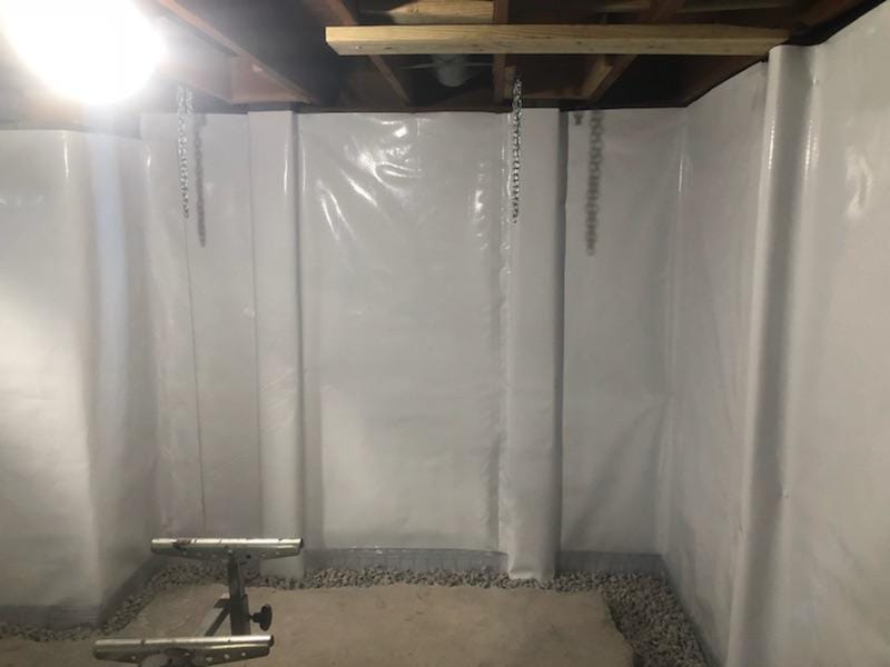 Vapor barrier corner with gravel bed and drain channel — Blue Springs, MO