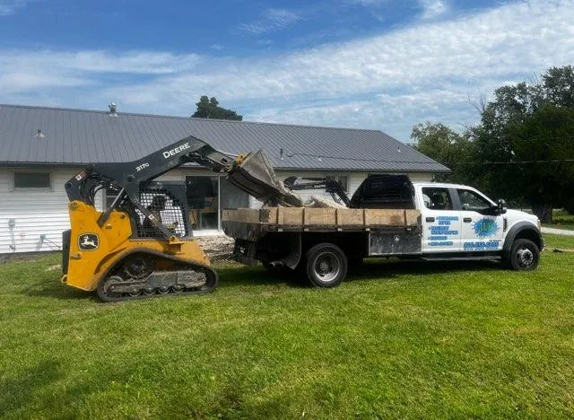 JLB Foundation Repair branded truck and heavy equipment — local crew, real tools, no subcontractors