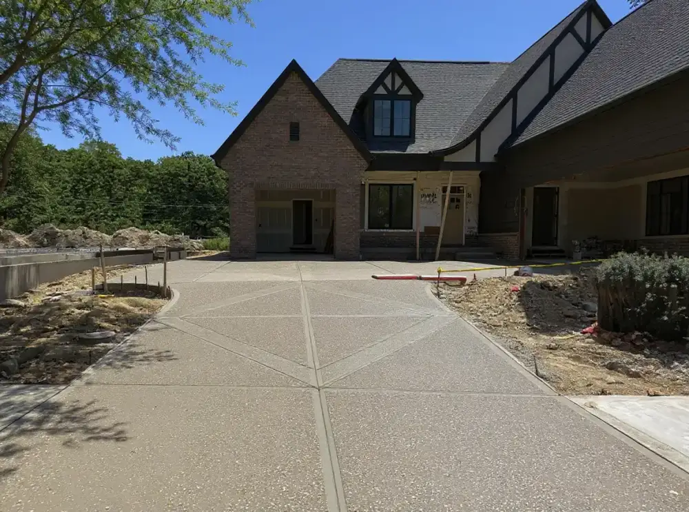 Exposed-aggregate concrete driveway — driveways by JLB in Ankeny, Iowa