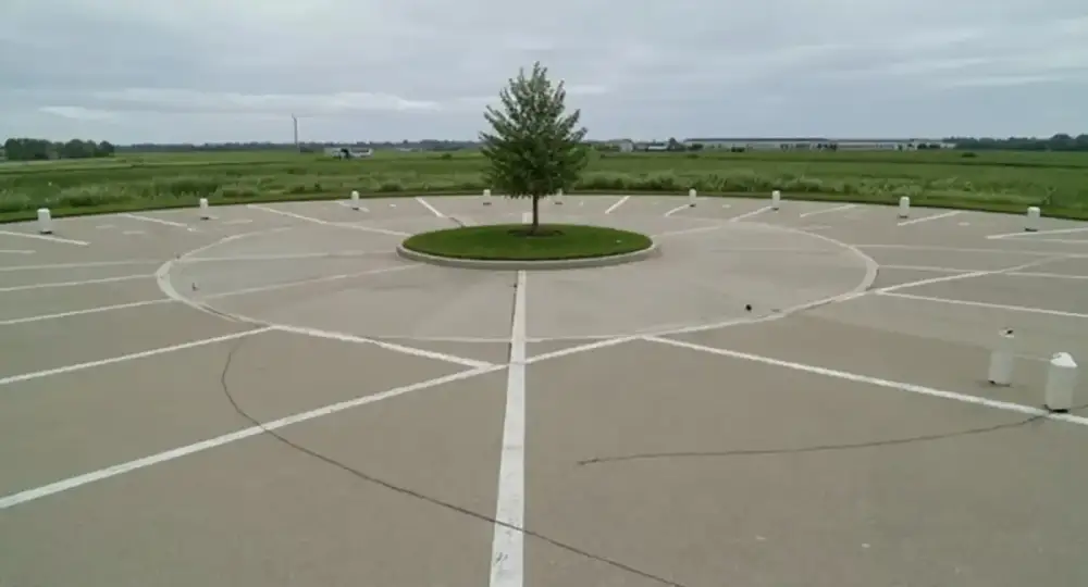 Concrete parking lot grid with painted stalls — parking lots by JLB in Ames, Iowa