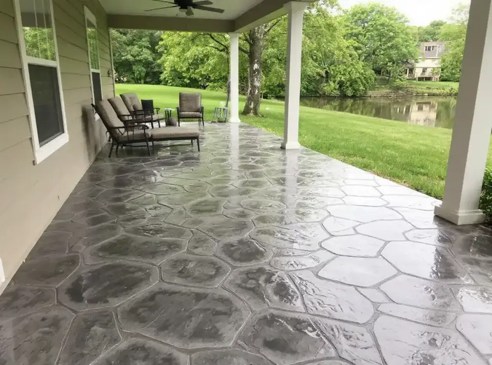 Blue-grey slate-texture stamped concrete patio — patios by JLB in Ames, Iowa