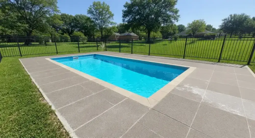 Wide concrete pool deck with expansion joints — pool decks by JLB in Ames, Iowa