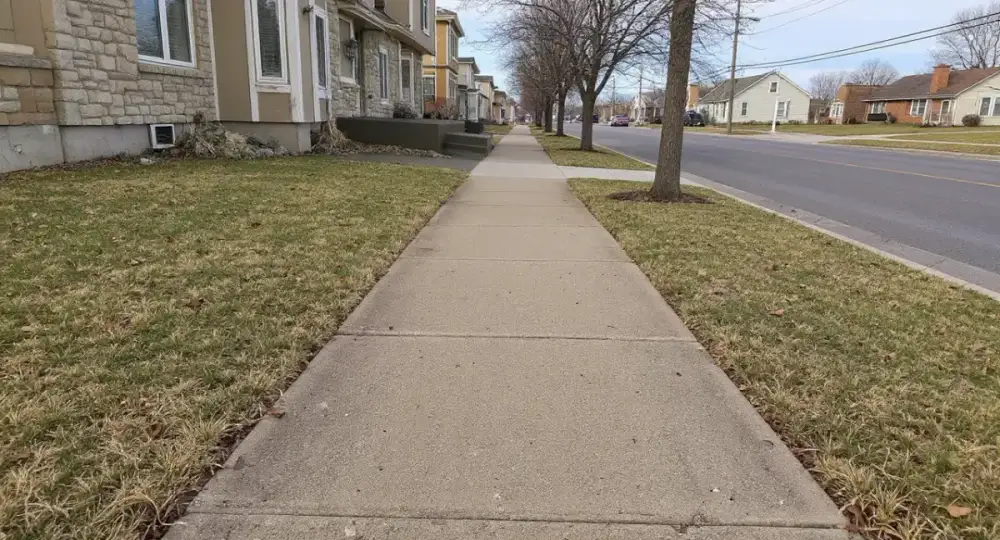 Concrete sidewalk along a residential street — sidewalks by JLB in Clive, Iowa