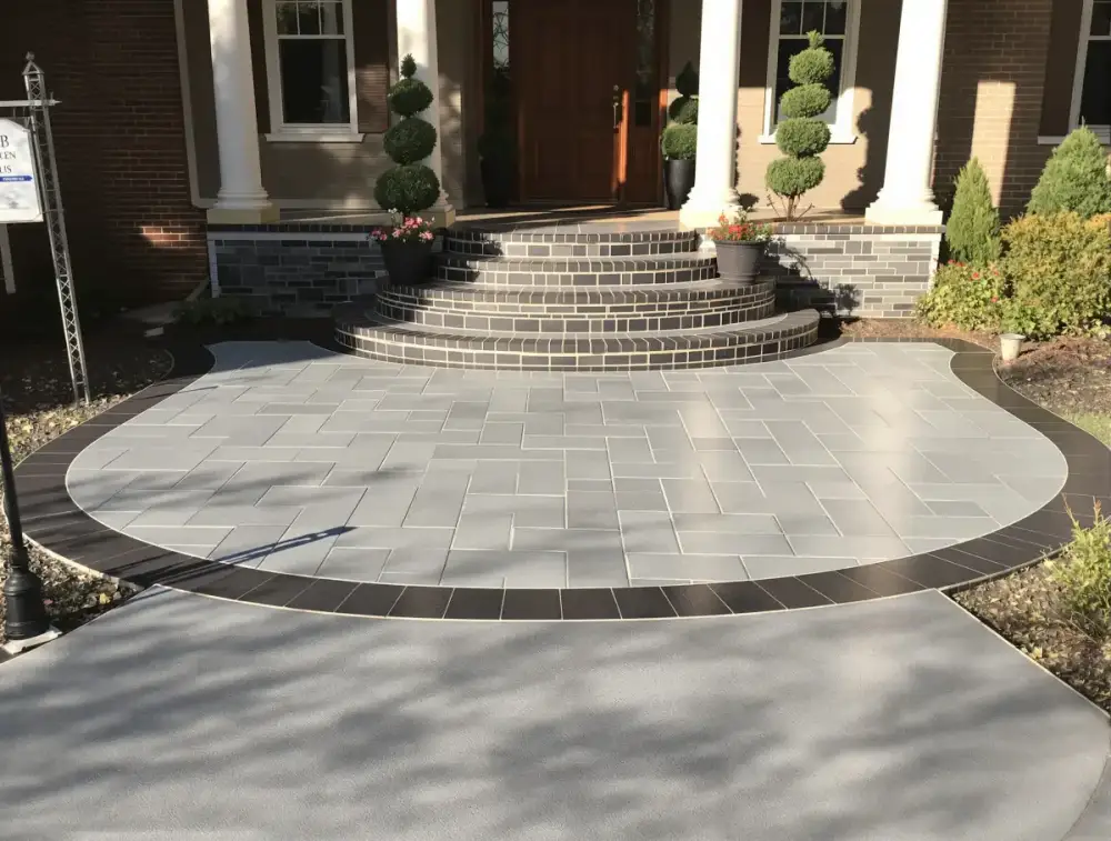 Slate-look stained concrete entry — stained concrete by JLB in Ames, Iowa