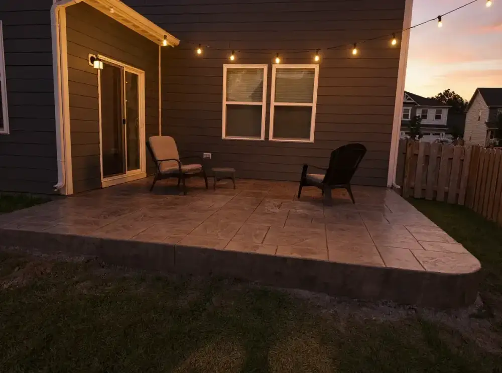 Warm ashlar-pattern stamped concrete — stamped concrete by JLB in Ankeny, Iowa