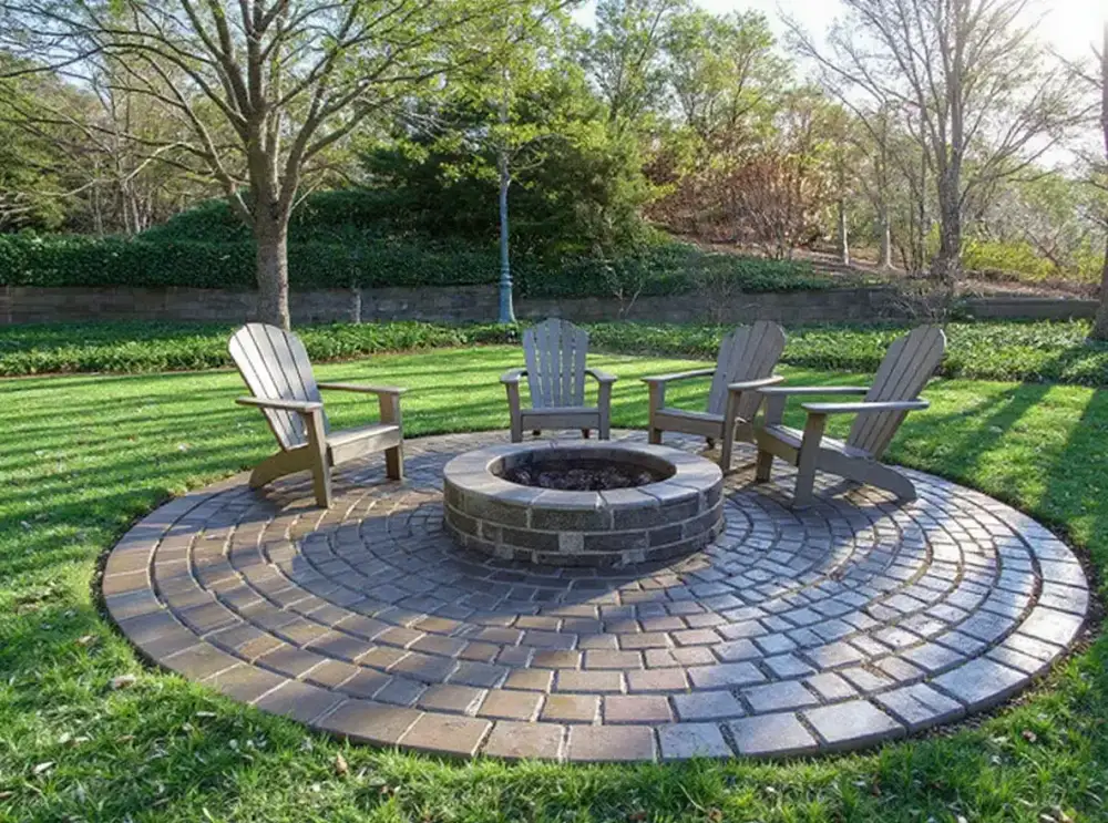 Cobblestone stamped concrete with fire pit — stamped concrete by JLB in Ankeny, Iowa