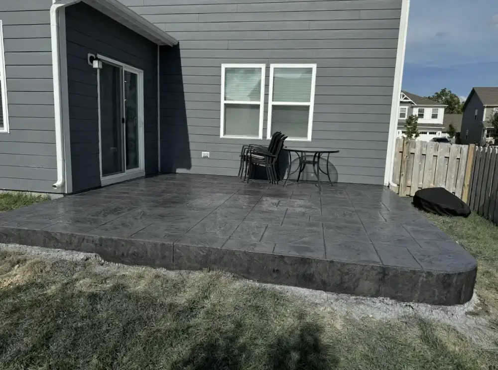 Charcoal slate-texture stamped concrete — stamped concrete by JLB in Ankeny, Iowa
