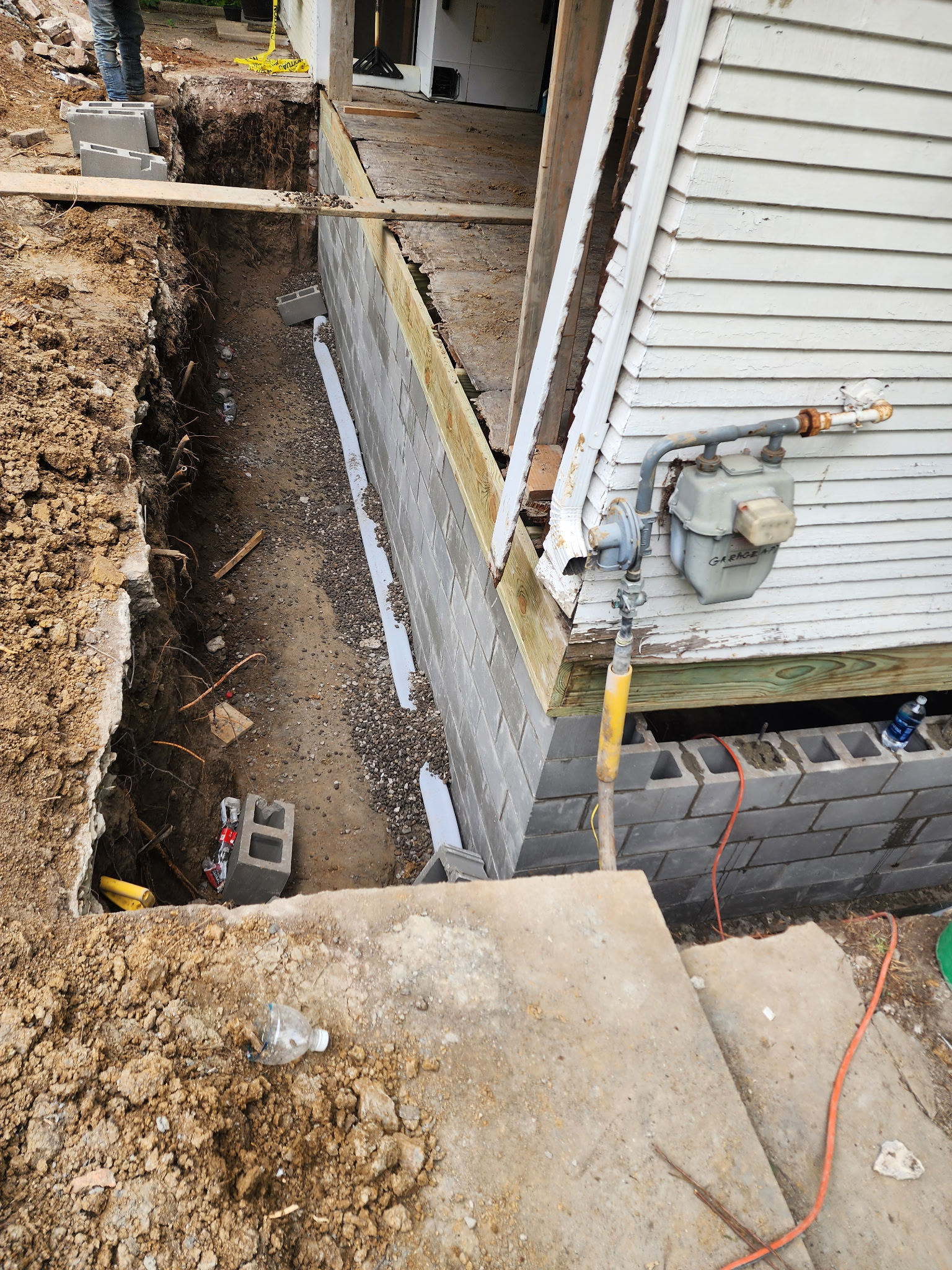 Block wall repair with new CMU during pier project