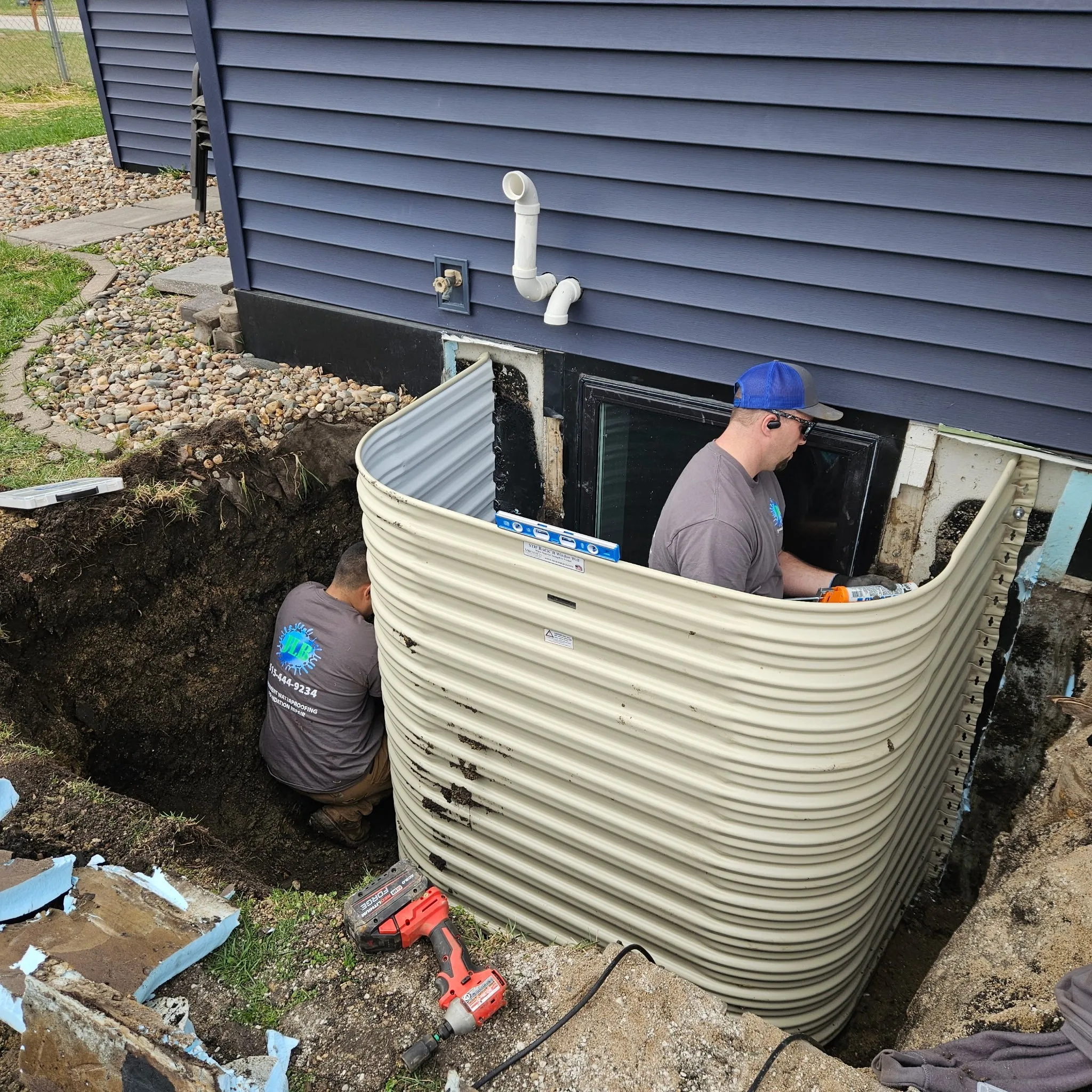Egress window well installation in Manson — exterior drainage included for harsh winters and spring snowmelt conditions