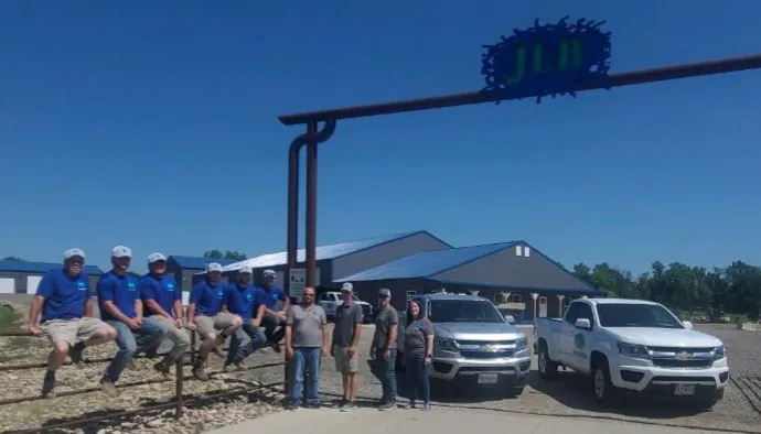 Full JLB Foundation Repair team with service vehicles in Dallas County