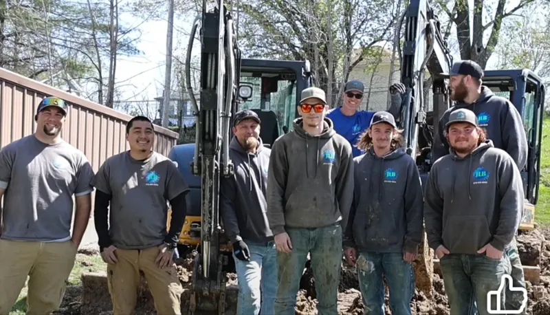 JLB Foundation Repair team members with excavators serving Van Meter and Dallas County