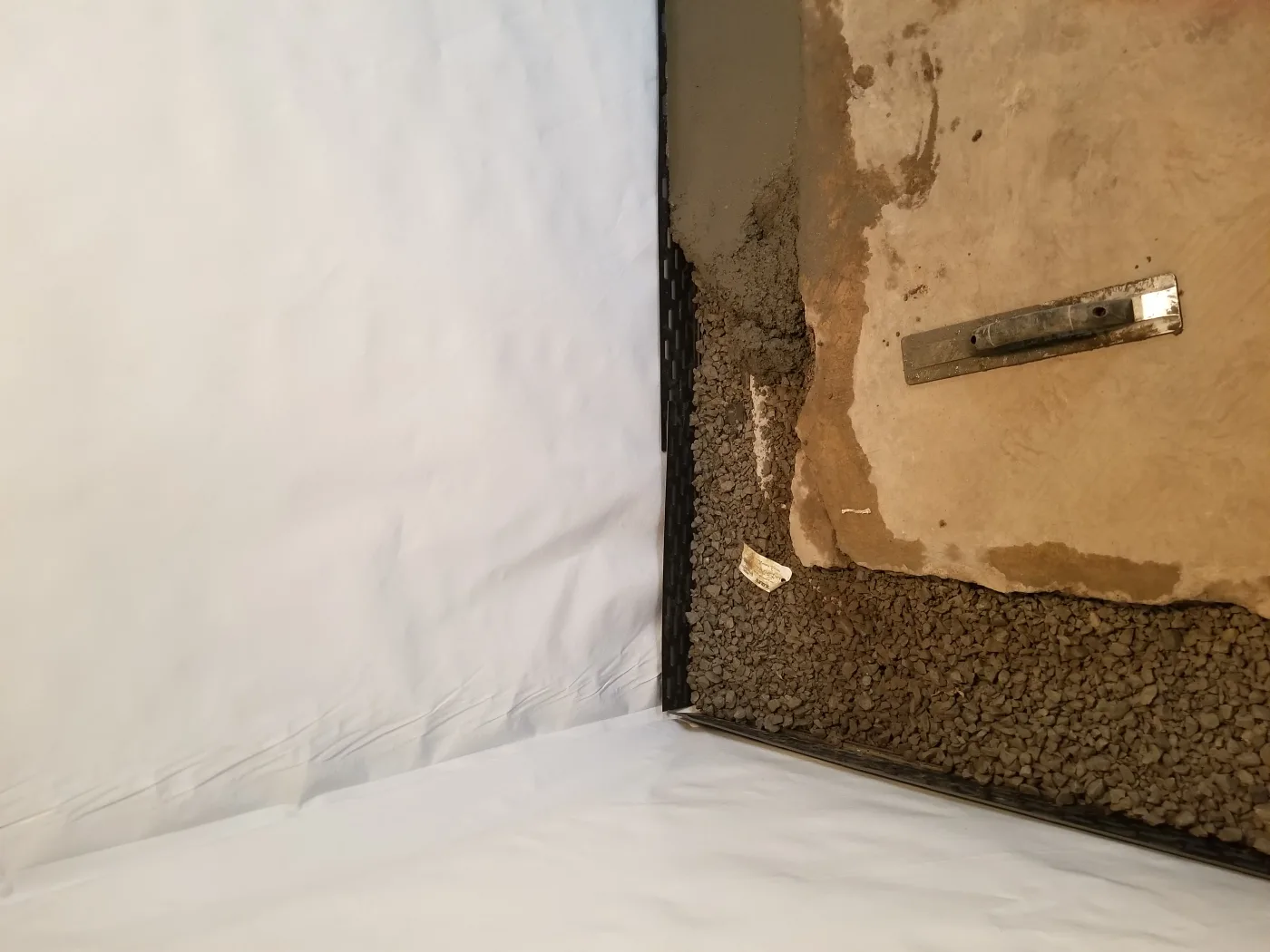 Interior drain tile and sump basement waterproofing in Conrad, Iowa