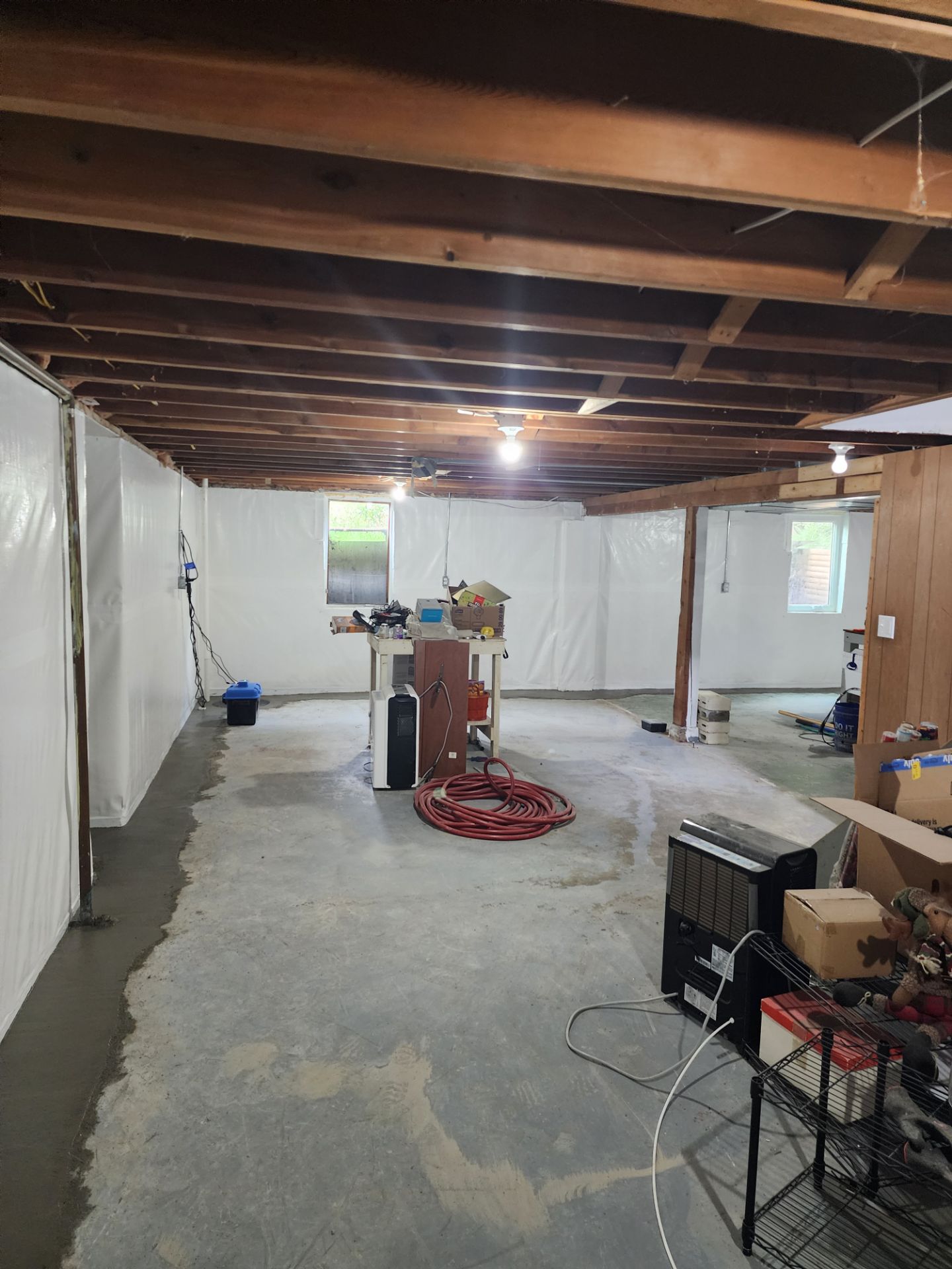 Completed vapor barrier on all basement walls
