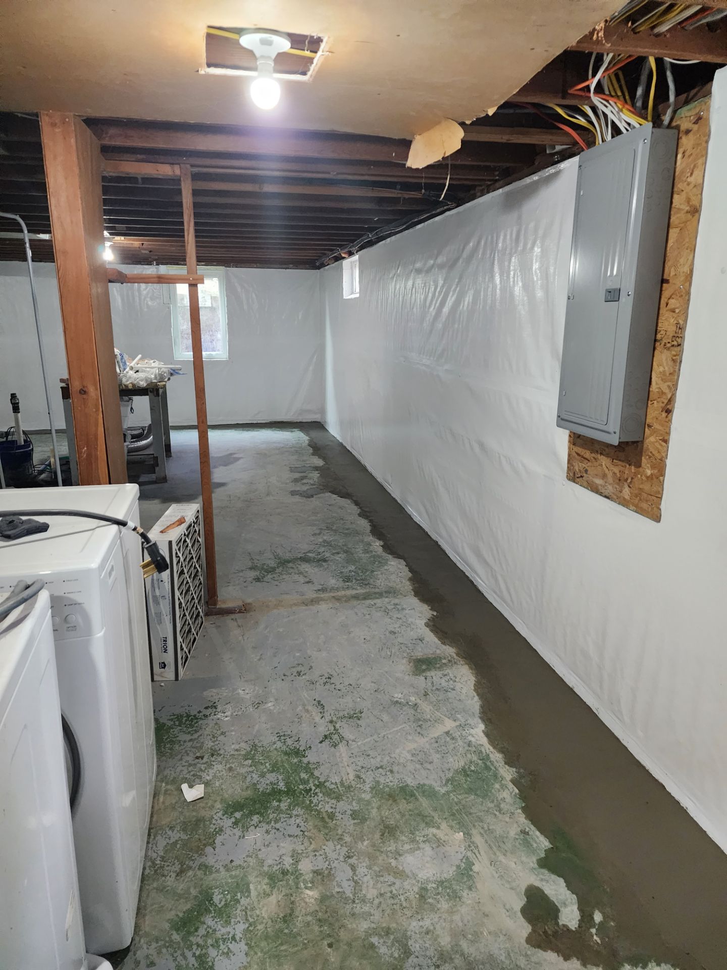 Vapor barrier installed around electrical panel